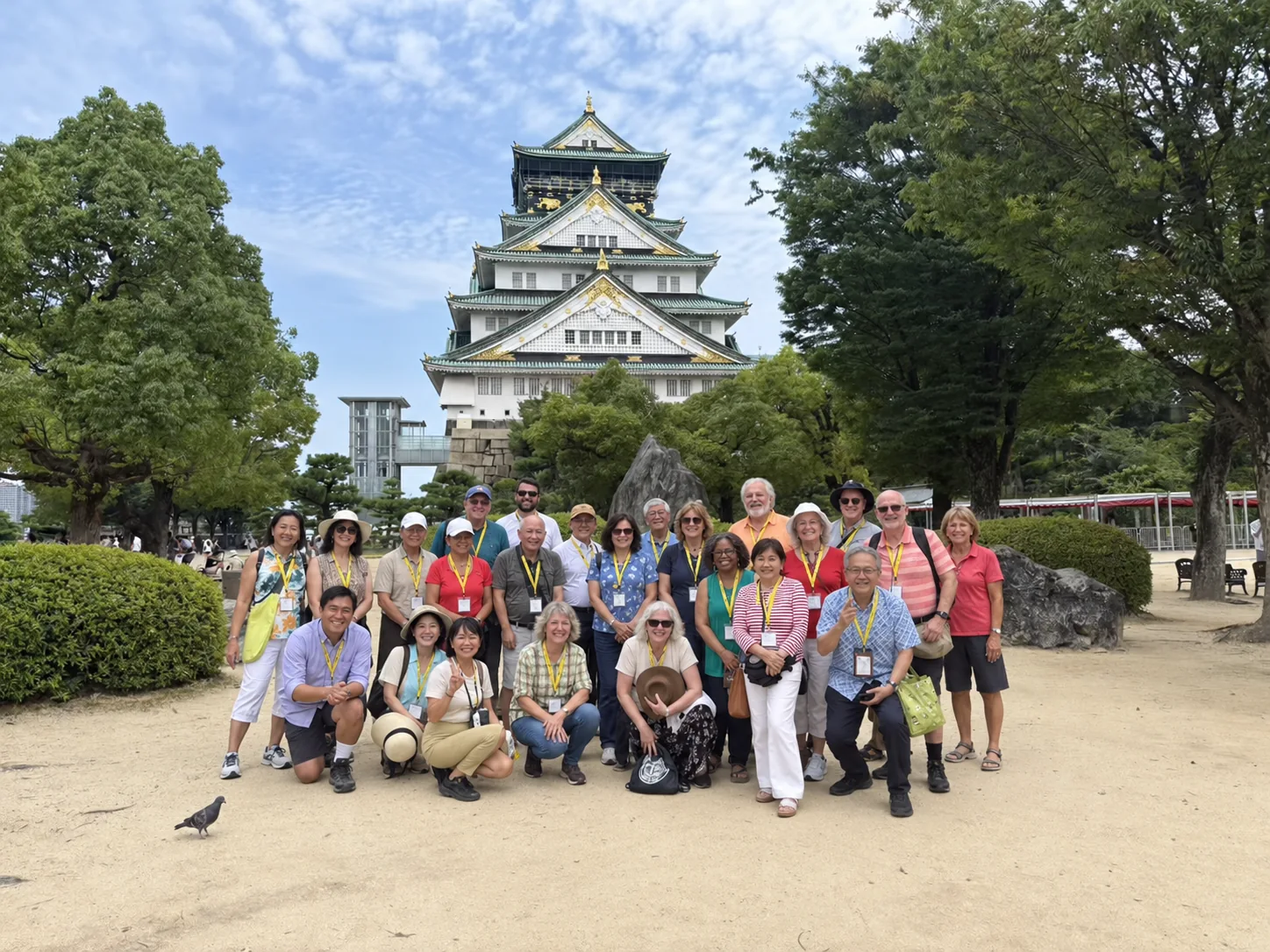 A Catholic pilgrimage group gathered together in front of Osaka Castle